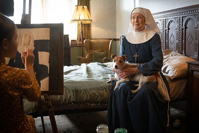 Sister Monica holds Nothing the dog in Call the Midwife