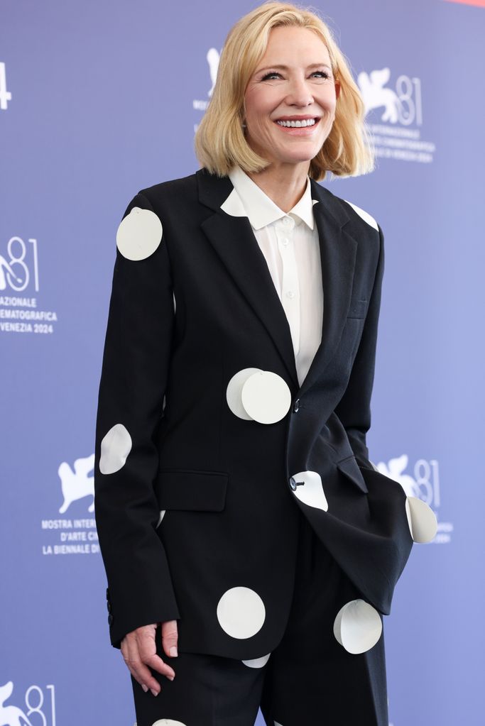 Cate Blanchett in a black suit with white oversized circles