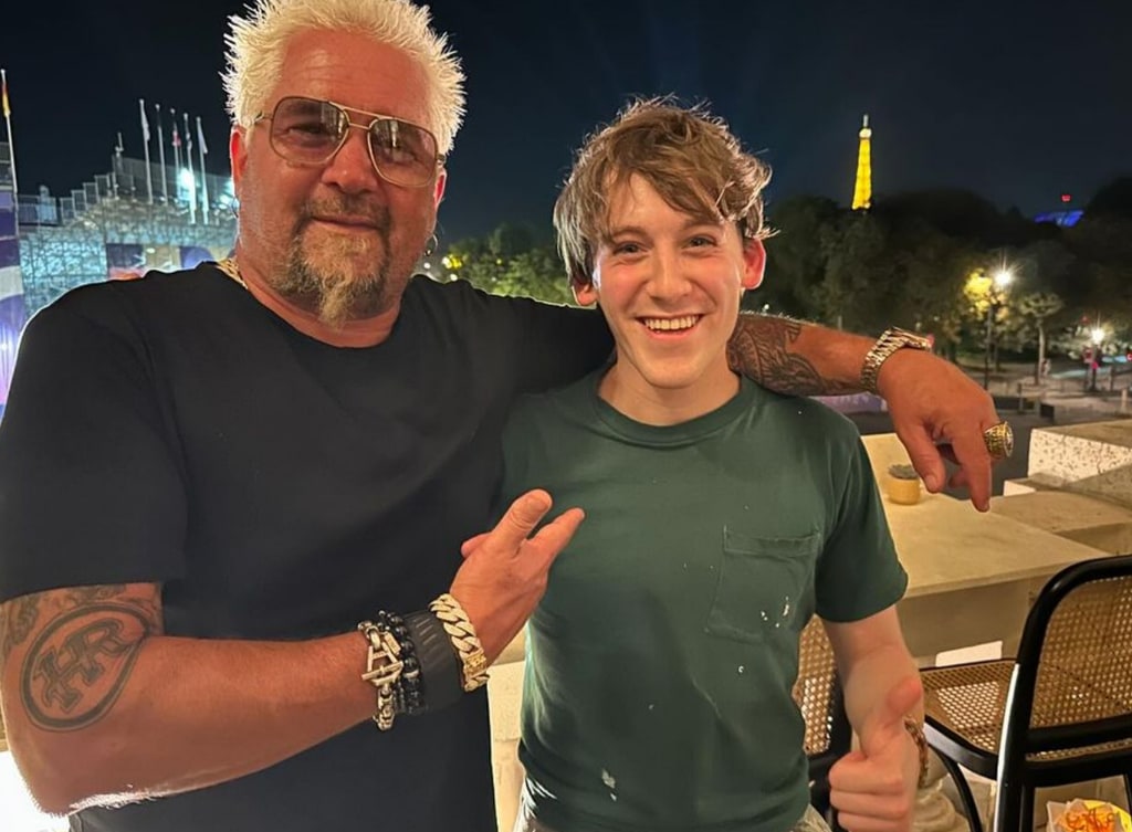 Photo shared by Sarah Jessica Parker's son James Wilkie on Instagram with Guy Fieri while on a family trip to the 2024 Olympics in Paris