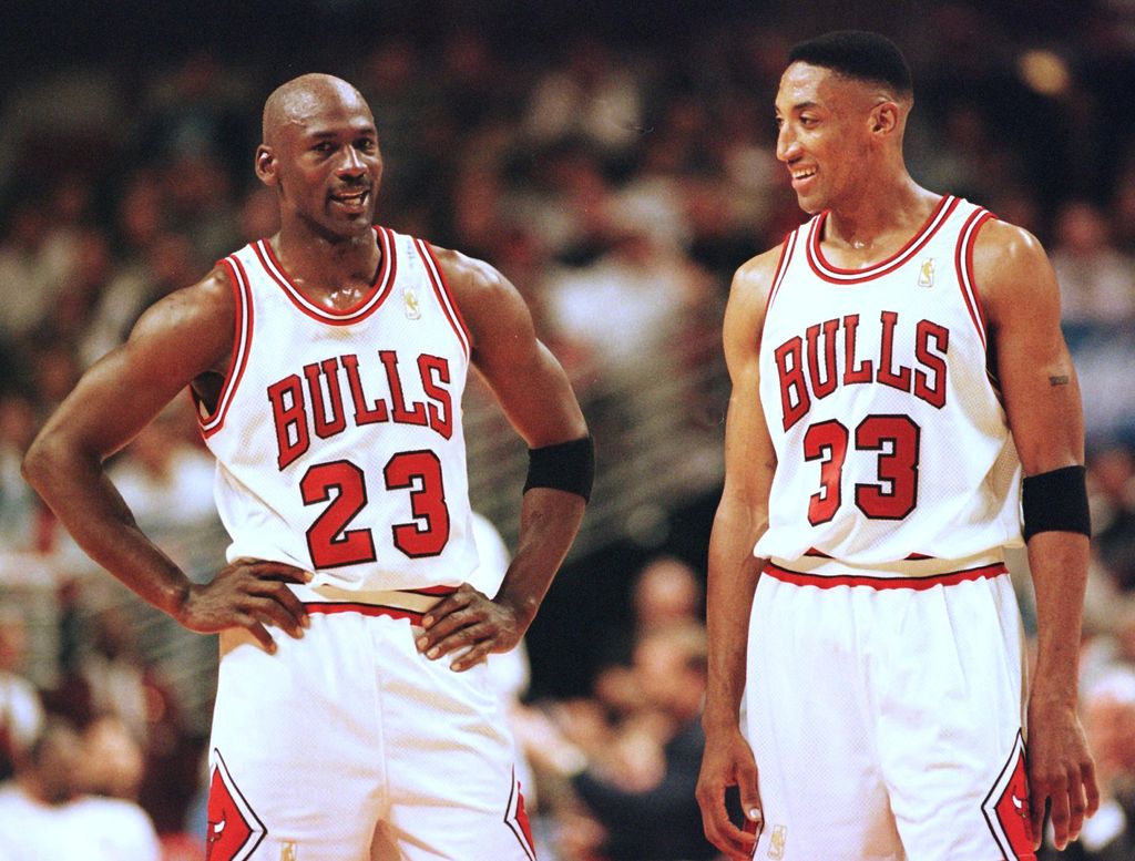 Michael Jordan (left) and Scottie Pippen (right) of the Chicago Bulls talk during the final minutes of their game in the NBA Eastern Conference Finals against the Miami Heat on May 22 at the United Center in Chicago, Illinois.