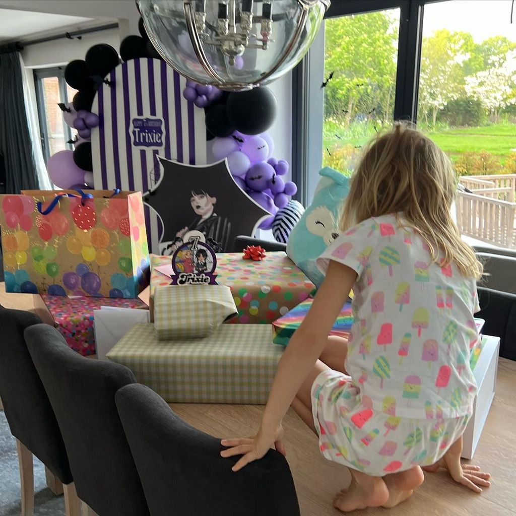 Emma shares photo of daughter Trixie in their dining room