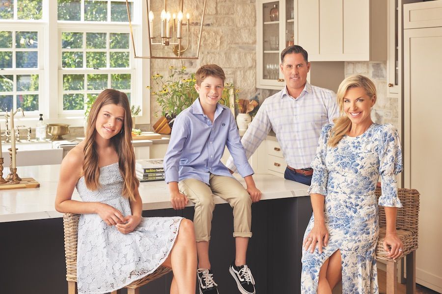 Carolyn MacKenzie and her family in their kitchen