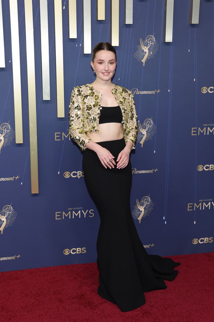 Actress Kaitlyn Dever proves you can wear a trophy jacket with formal wear