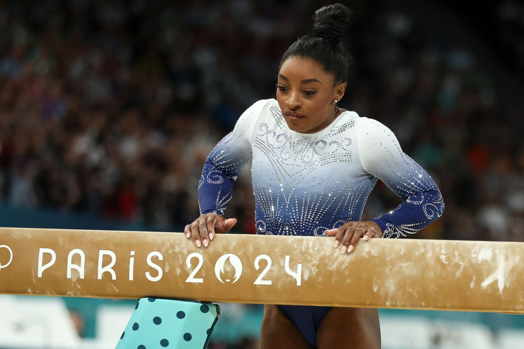 Simone Biles of USA fails while women's balance beam finale on day ten of the Olympic Games Paris 2024 at Bercy Arena on August 05, 2024 in Paris, France