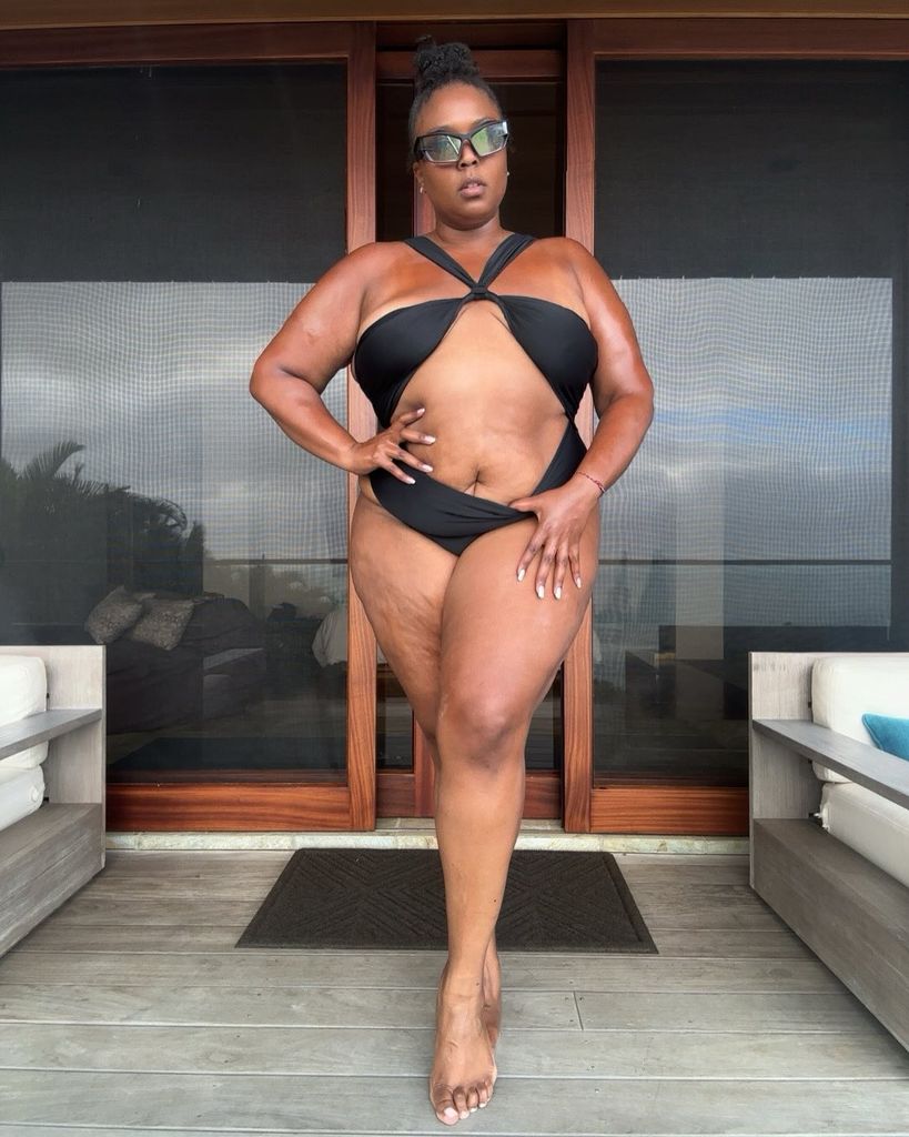 lizzo in black swimsuit