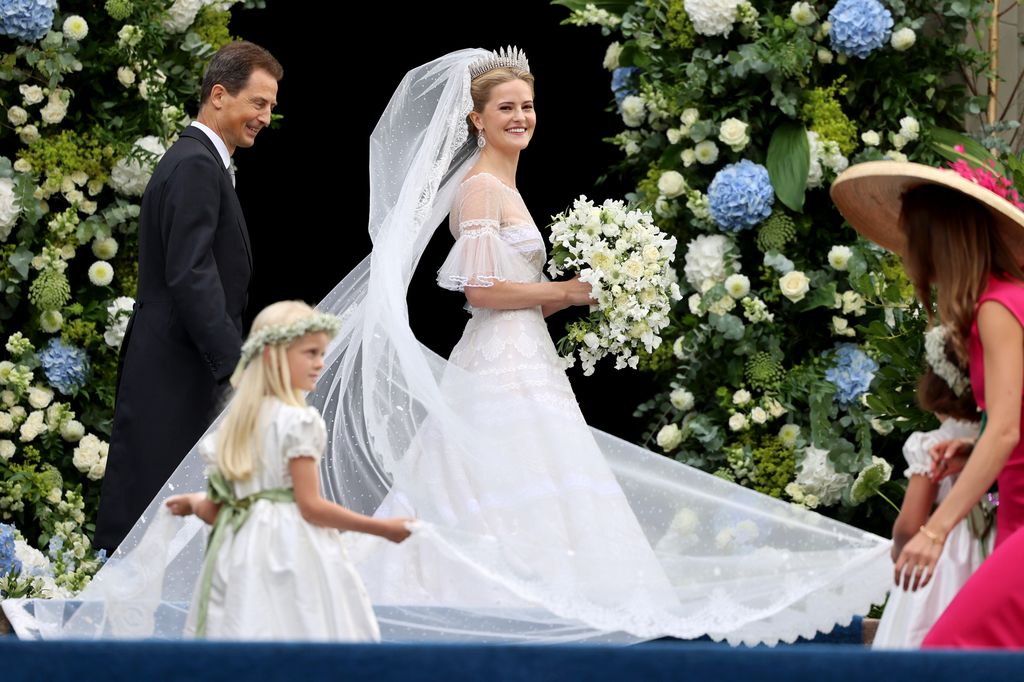 Alois, Hereditary Prince of Liechtenstein and Princess Marie Caroline Of Liechtenstein arrive at the wedding of Princess Marie Caroline of Liechtenstein To Mr Leopoldo Maduro Vollmer at Cathedral of St. Florin 