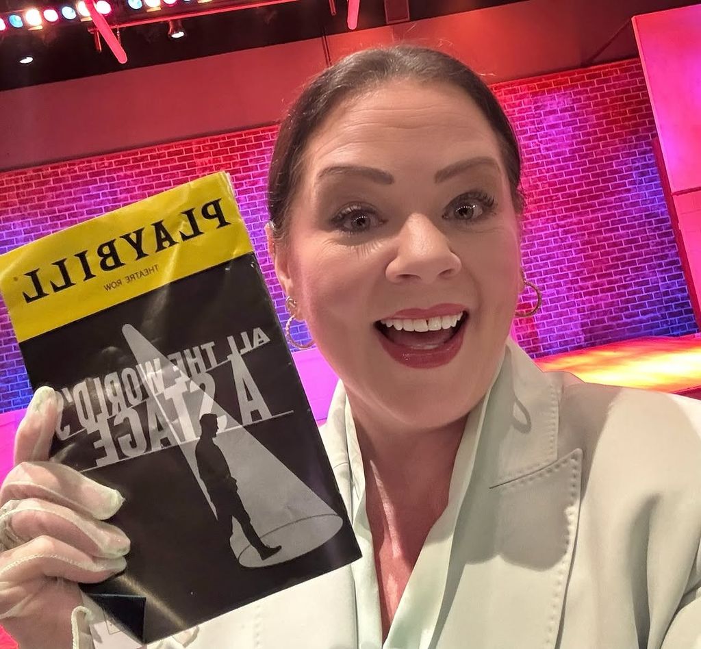 Melissa McCarthy poses for a photograph with the playbill of "All the World's a Stage" at Theatre Row in New York City, shared on Instagram