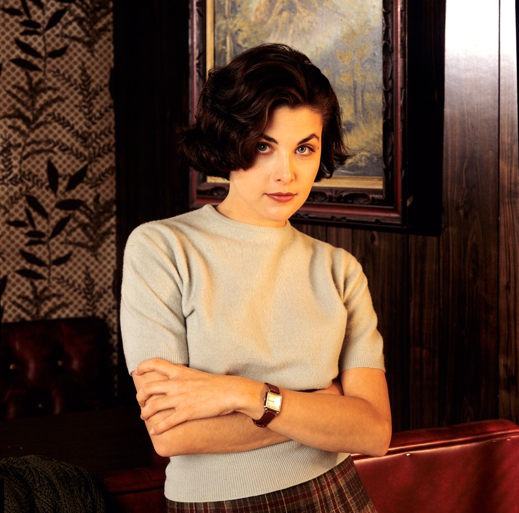 Sherilyn Fenn as Audrey Horne, the teenage daughter of a wealthy businessman, in Twin Peaks
