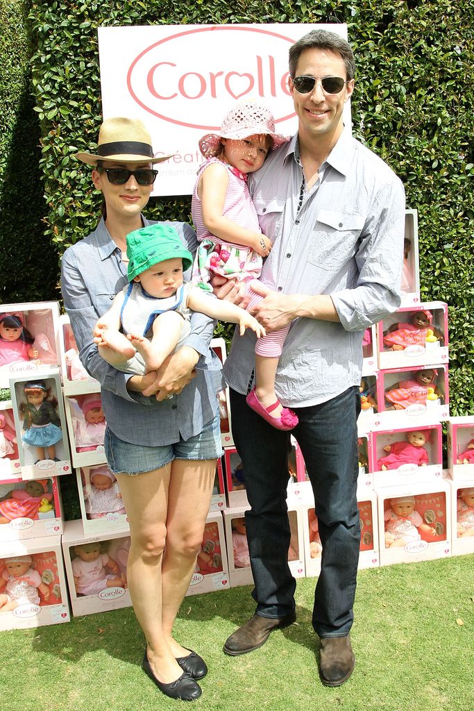 Bree Turner, Dean Saliman, Stella Jean Saliman and Justin Saliman attend the Corolle Adopt a Doll Event at The Grove on May 18, 2013 in Los Angeles, California