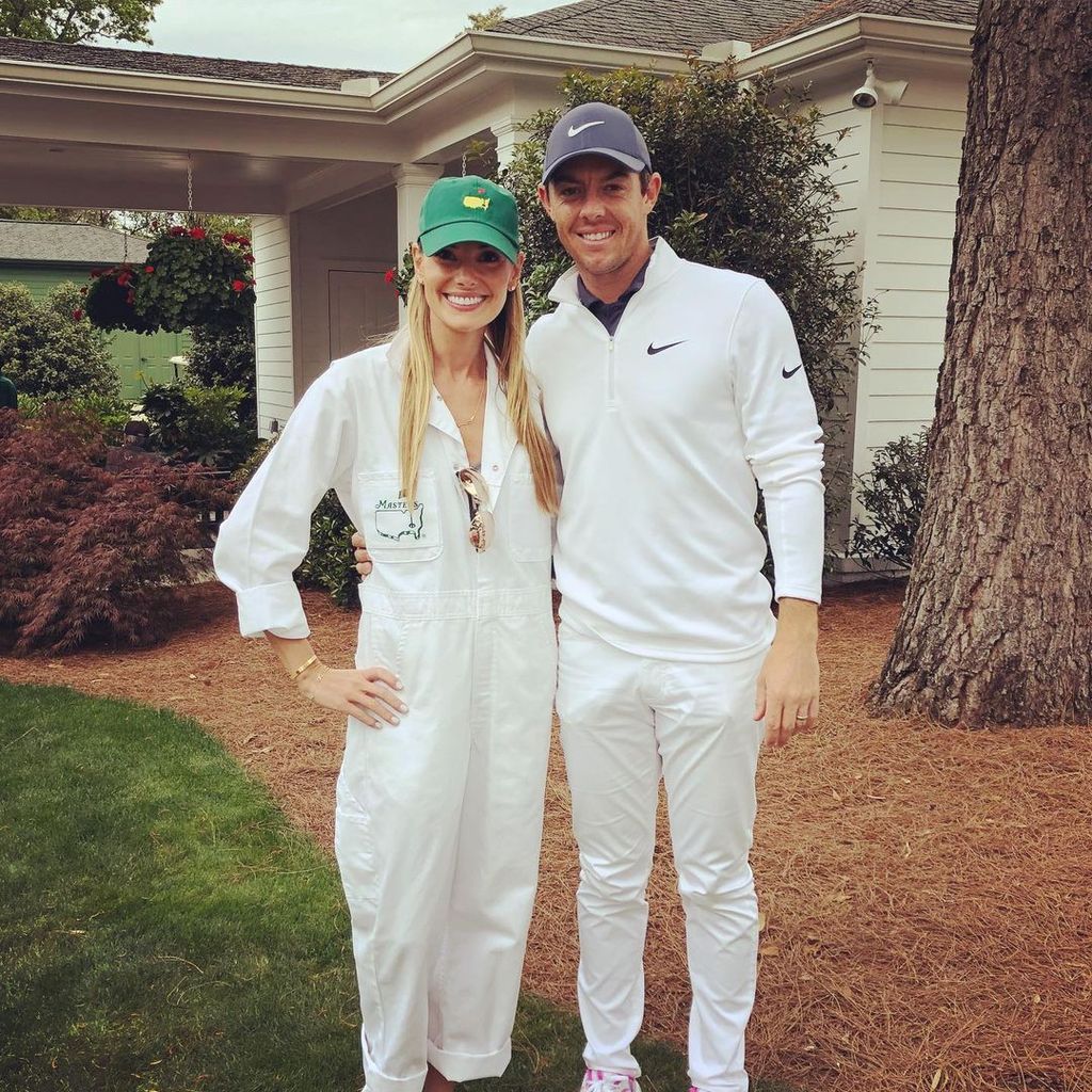 Rory and Erica smiling outside home in Instagram picture taking in 2019