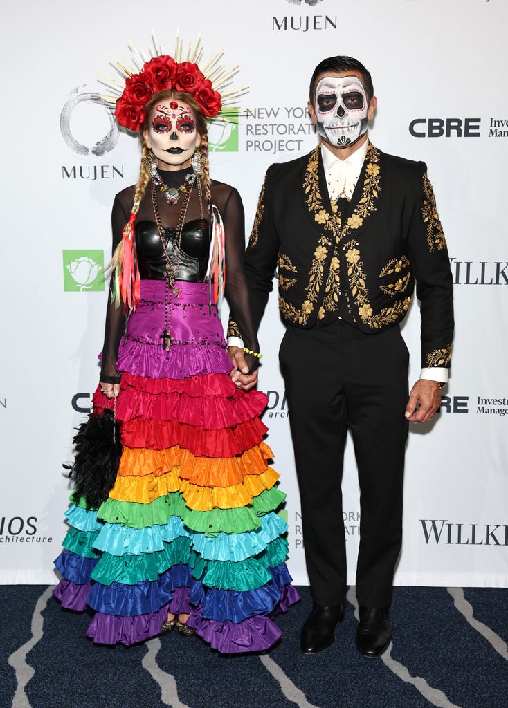 Kelly Ripa and Mark Consuelos attend Bette Midler's Annual Hulaween Bash in 2023