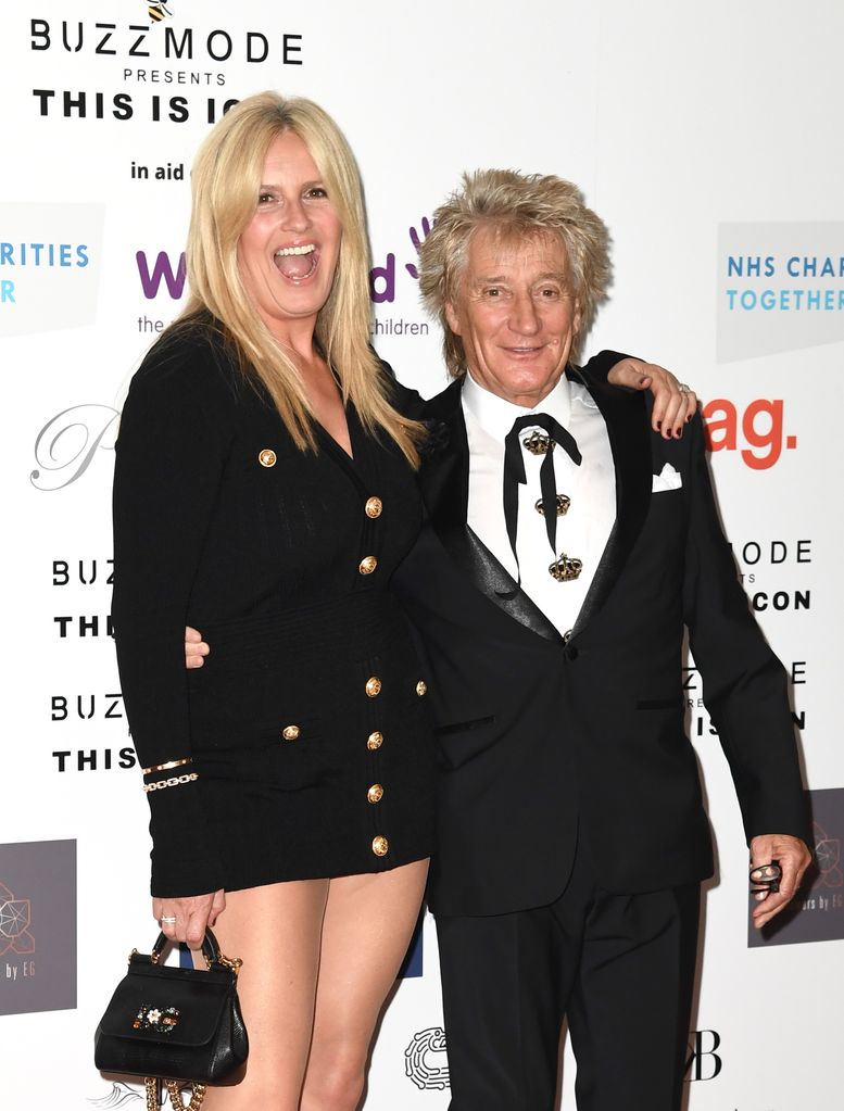 Penny Lancaster with arm around Rod Stewart