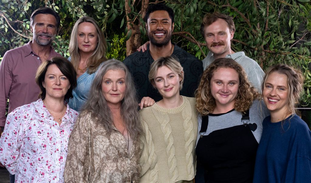 group of people smiling for photo