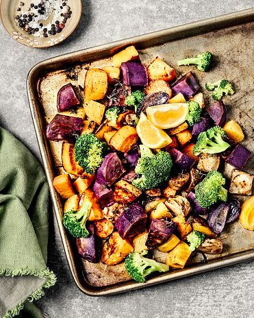 Roasted vegetables on baking sheet