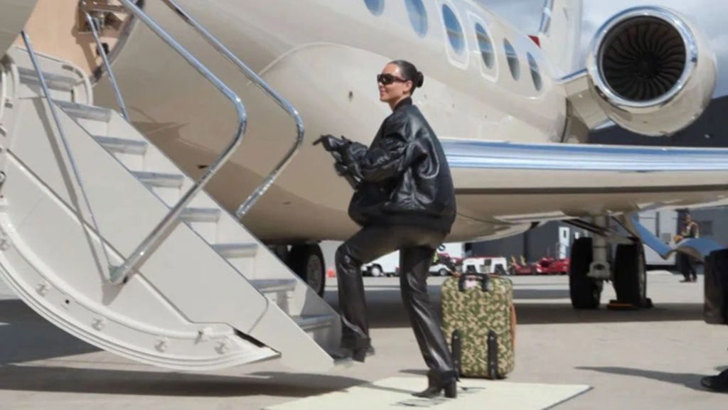 Kim boards her private jet Kim Air