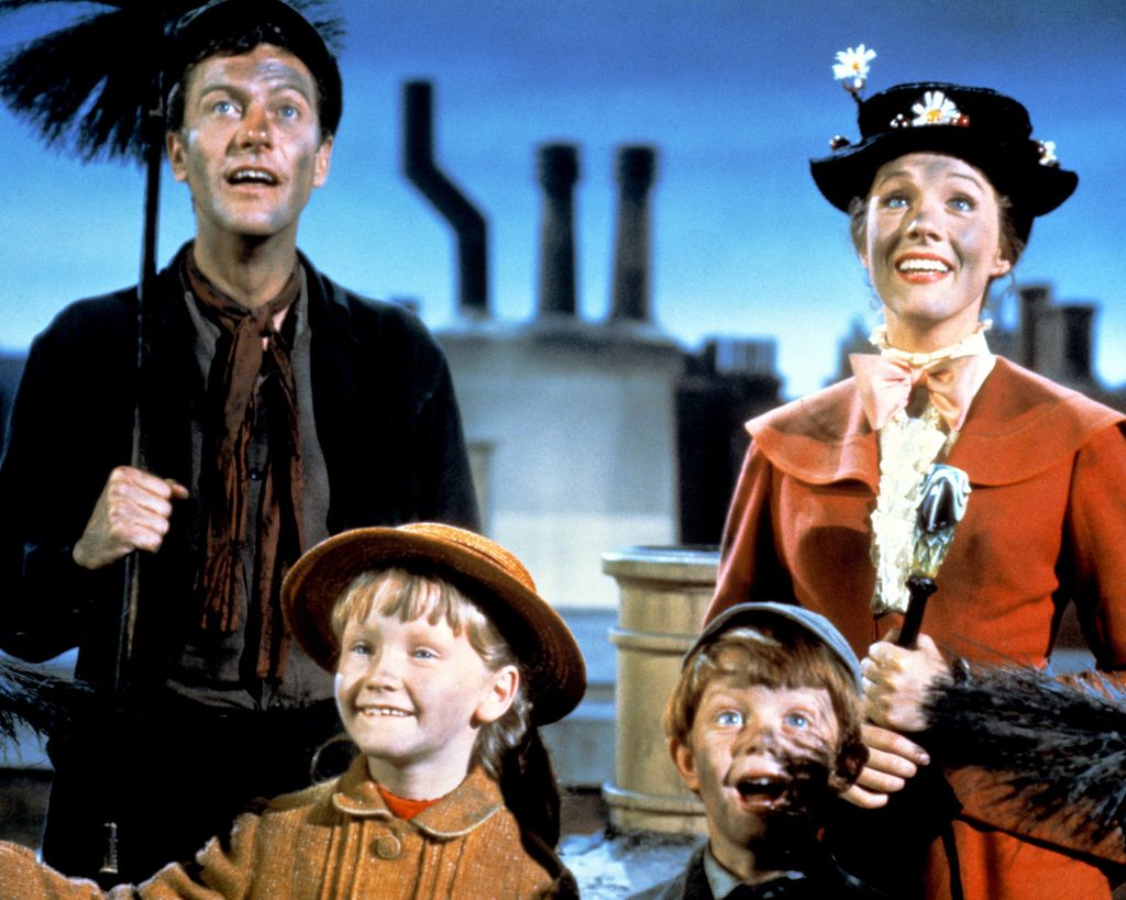 Dick Van Dyke as Bert, Julie Andrews as Mary Poppins, Karen Dotrice as Jane Banks and Matthew Garber as Michael Banks