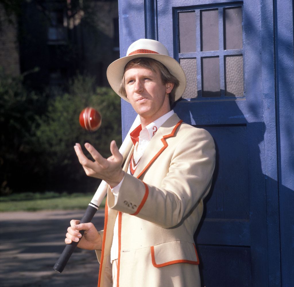 Peter Davison in character as The Doctor with a cricket ball