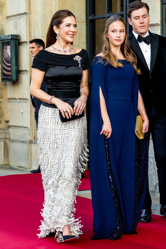 Queen Mary smiling next to Princess Josephine