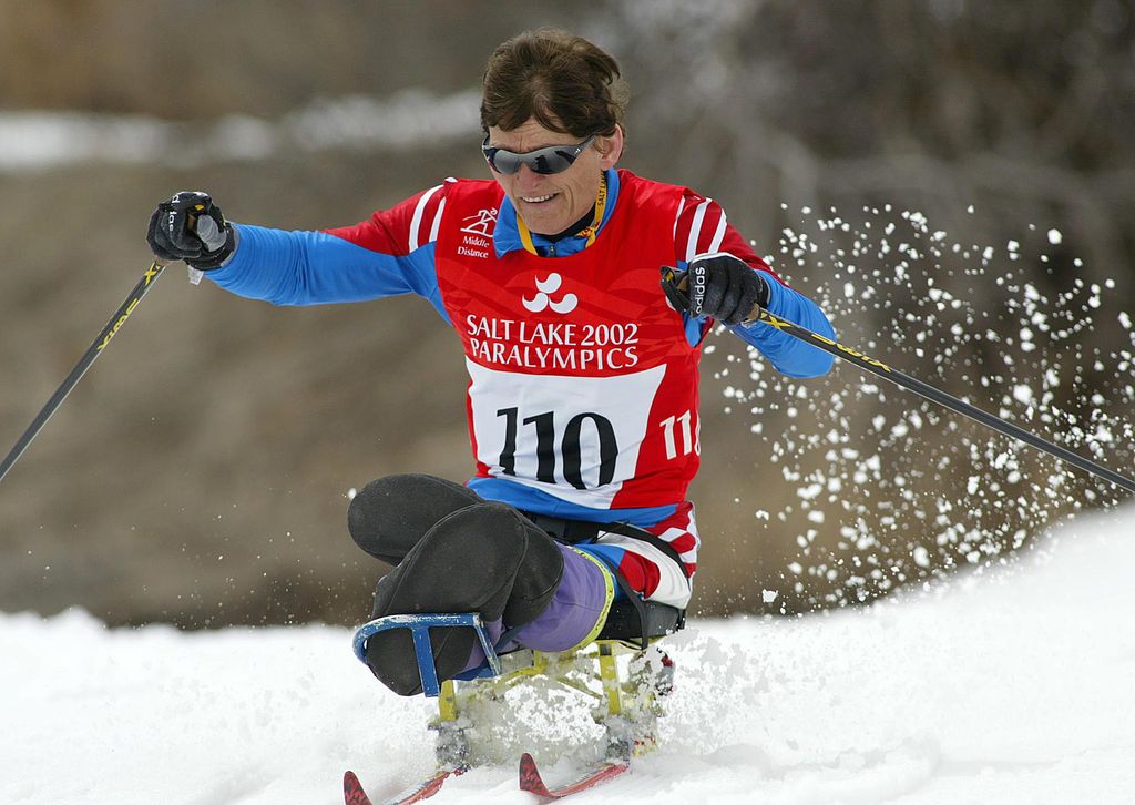 Ragnhild Myklebust of Norway ski's down a hill during the Cross-Country middle distance 5km Sitski at the Paralympics in Soldier Hollow, Utah. The 58-year-old Paralympian finished first in her group to win the Gold medal.