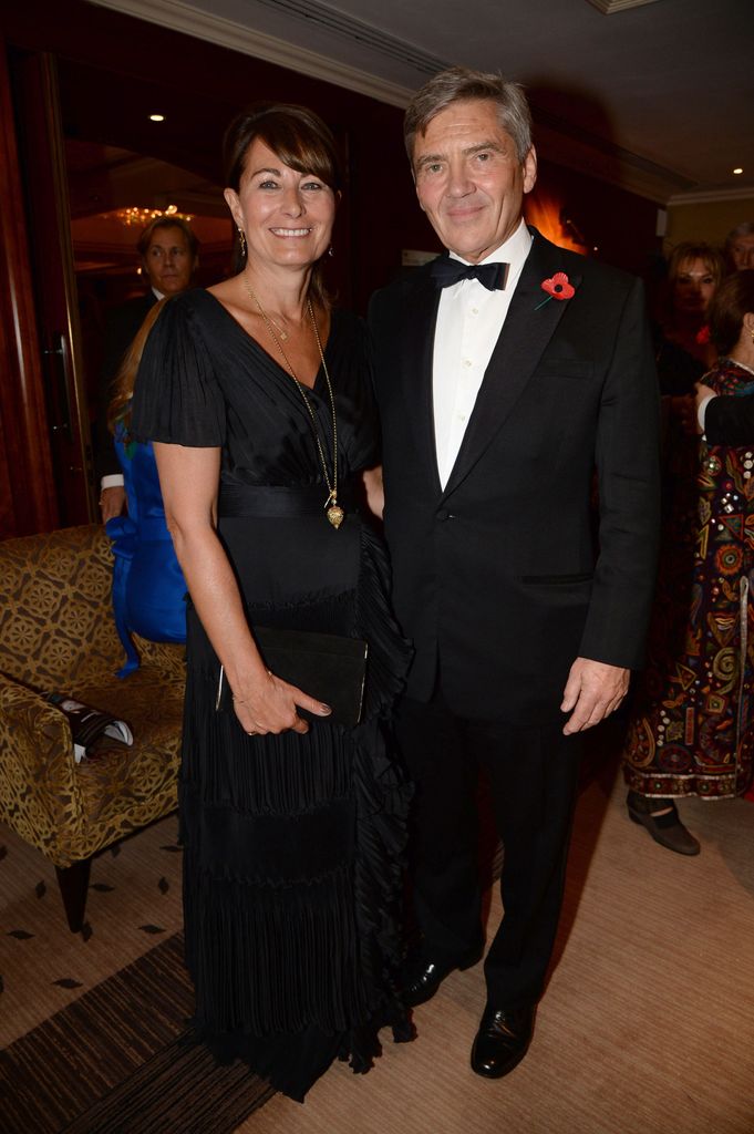 Carole Middleton in a black dress and Michael Middleton in a tuxedo
