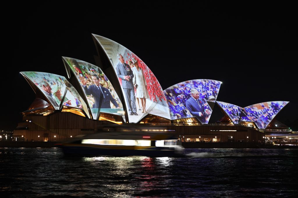 A projection of photographs of Britain's King Charles III and Queen Camilla is seen on the Sydney Opera House in Sydney