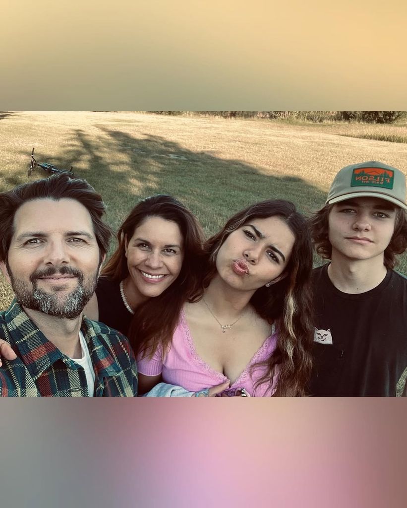 Adam Scott with his wife and kids