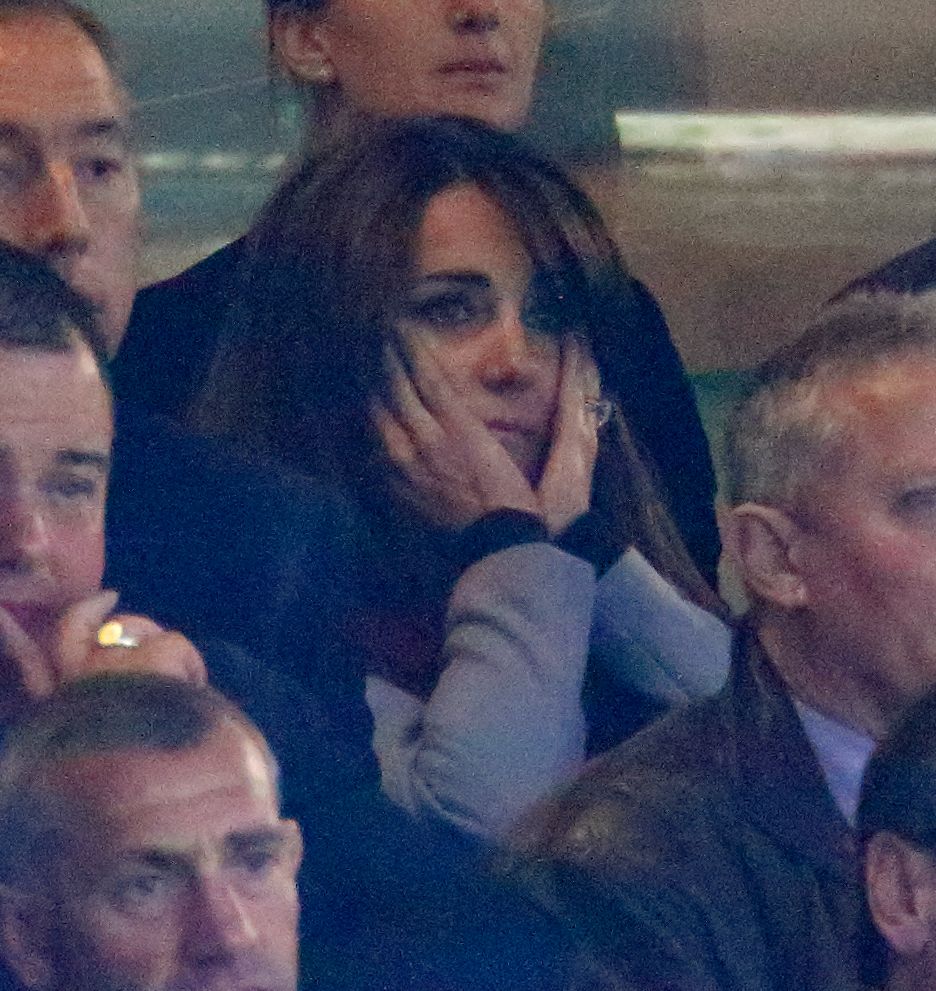 Princess Kate looking worried at the rugby