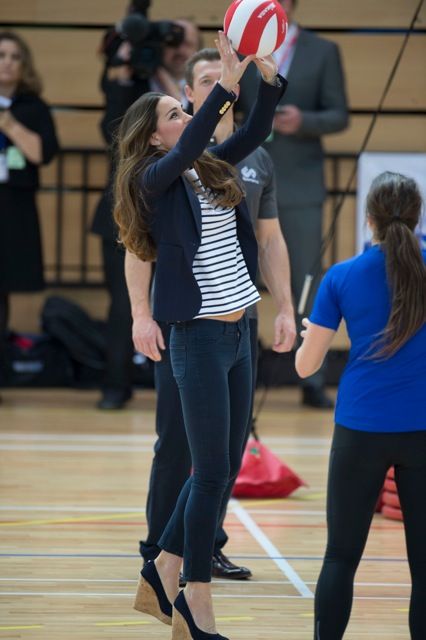 Kate Middleton playing Volleyball wearing high heels