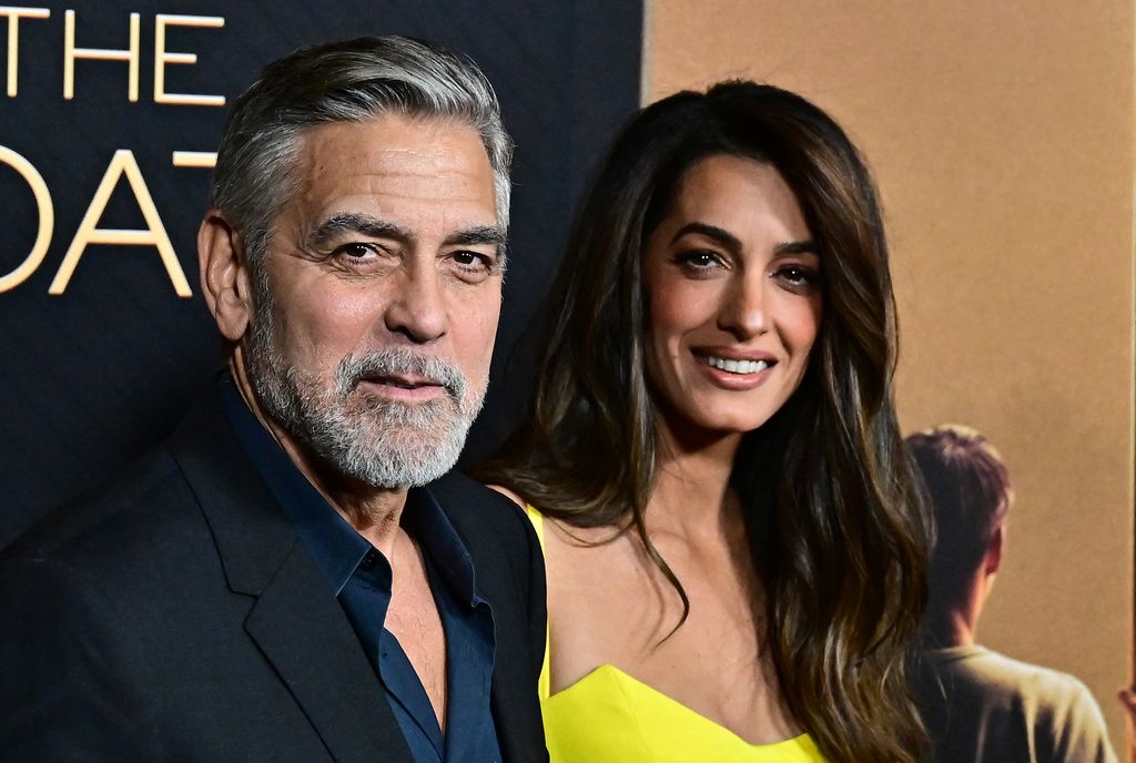 US actor George Clooney and his wife Lebanese-British barrister Amal Clooney attend the LA premiere of Amazon MGM Studios' "The Boys in the boat" at the Samuel Goldwyn theatre in Beverly Hills, California, December 11, 2023.