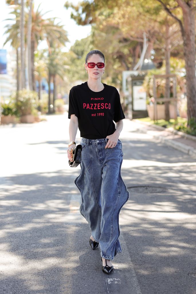 Coco Rocha is seen during the 77th Cannes Film Festival on May 22 in jeans and a t-shirt