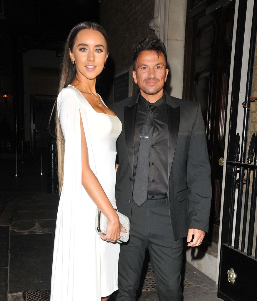 Emily and Peter Andre in smart clothes