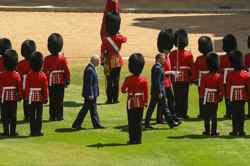 King Charles III and President of France, Emmanuel Macron inspect the Guard of Honour at the Ceremonial Welcome for the state visit to the UK of the President of France Emmanuel Macron and his wife Brigitte Macron at Windsor Castle