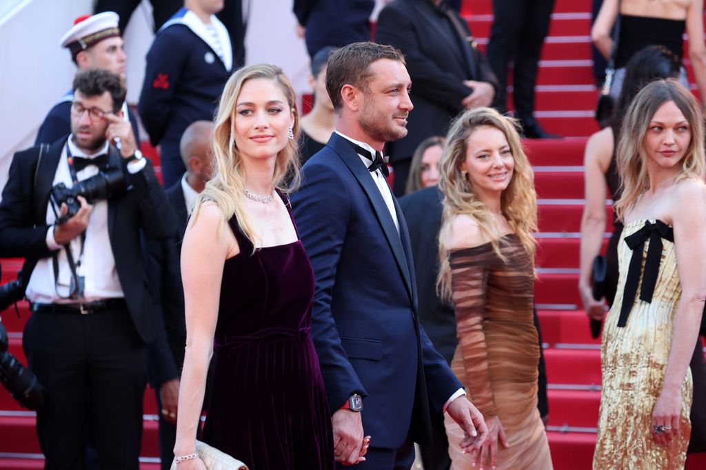 couple on red carpet at cannes film festival 