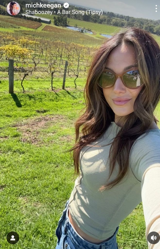 woman taking selfie on vineyard