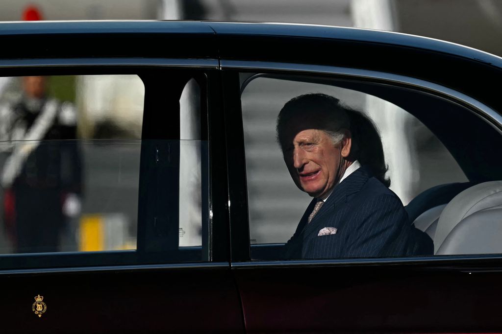 king charles in car
