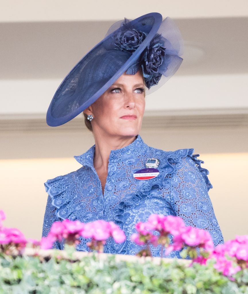 Sophie in blue hat and dress