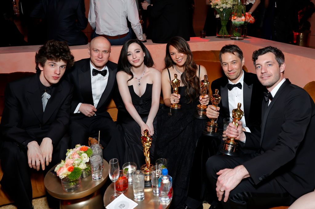 Mark Eydelshteyn, Yura Borisov, Mikey Madison, Samantha Quan, Sean Baker and Alex Coco attend the 2025 Vanity Fair Oscar Party Hosted By Radhika Jones at Wallis Annenberg Center for the Performing Arts on March 02, 2025 in Beverly Hills, California