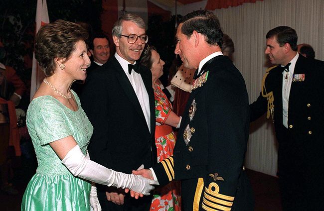 Prince Charles greeting John and Norma Major