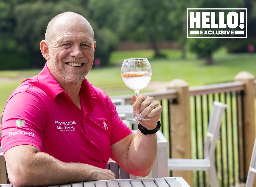 Mike Tindall holding a glass of Blackeye gin