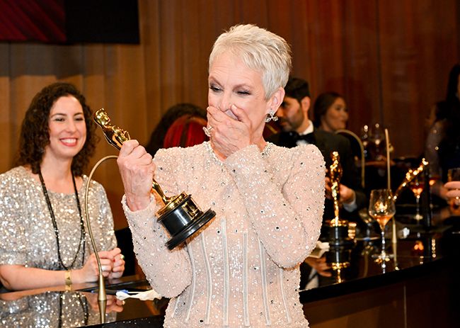 Jamie Lee Curtis covers mouth in shock after winning Oscars