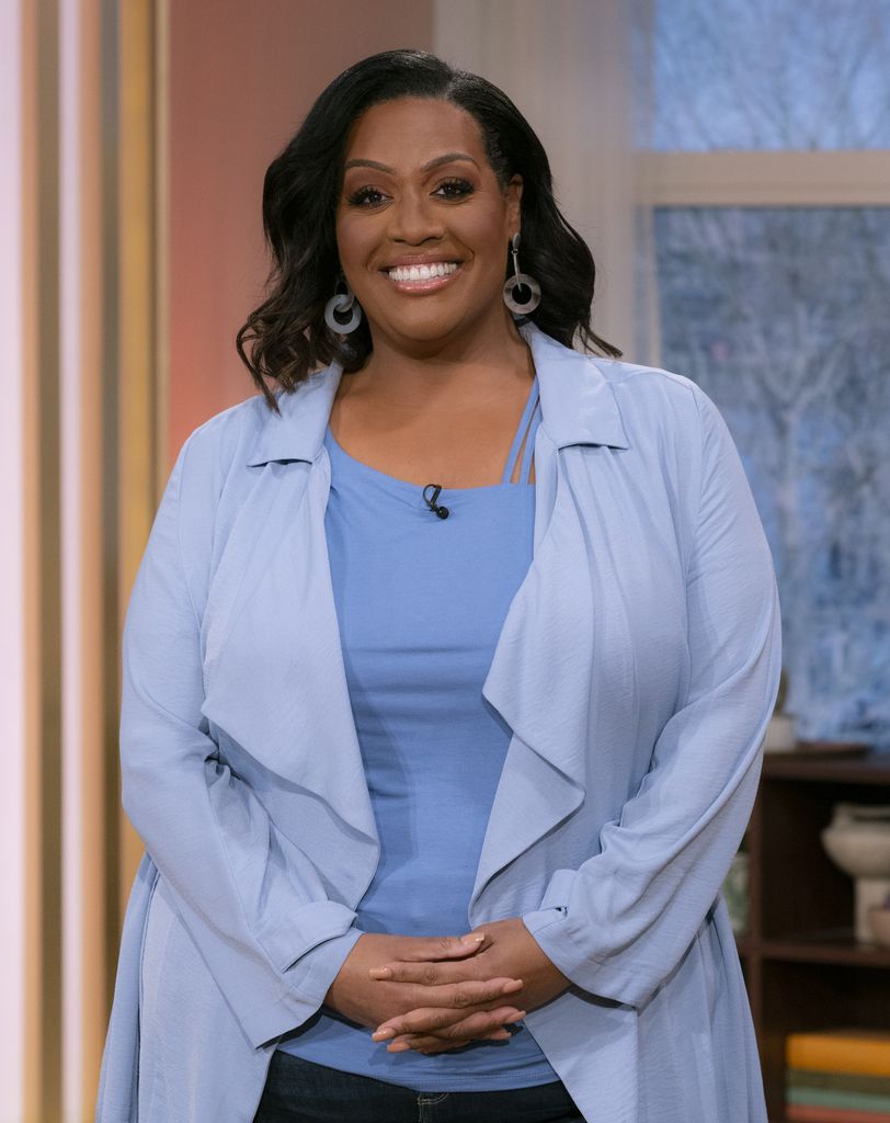 Alison Hammond in a blue shirt and blazer