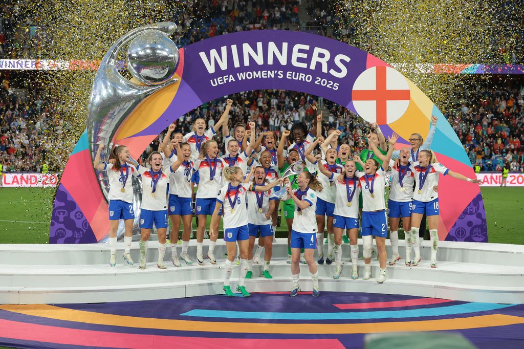 England celebrate with the trophy for the second consecutive tournament following the 3-1 penalty shoot out victory in the UEFA Women's EURO 2025 Final match between England and Spain at St. Jakob-Park on July 27, 2025 in Basel, Switzerland