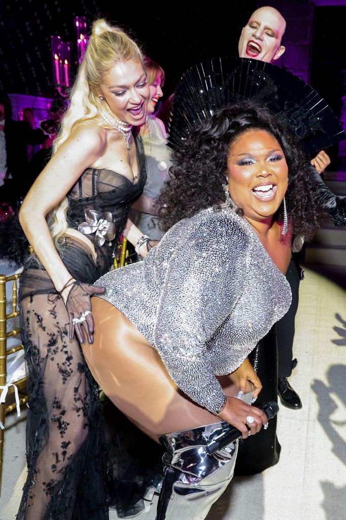 Lizzo rocked a silver bodysuit to perform for guests at the Met Gala
