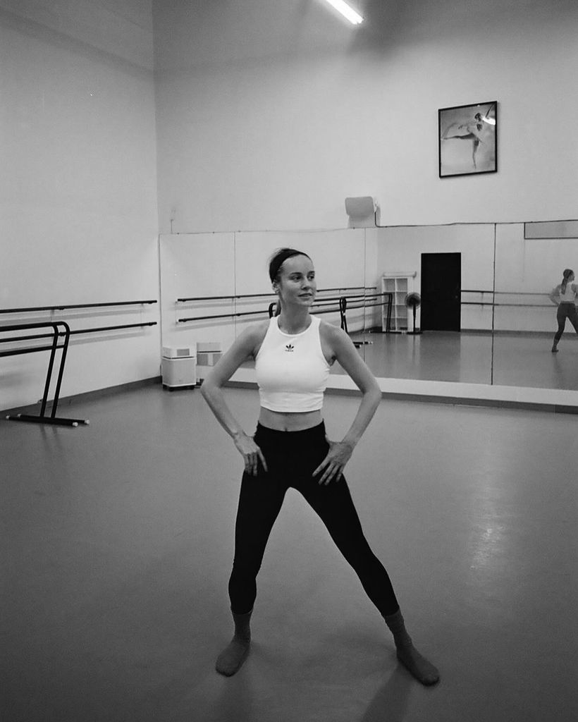 Brie in black and white in ballet studio