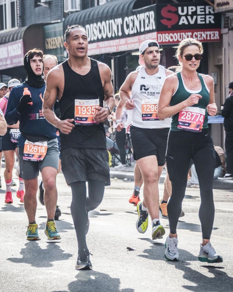 T.J. Holmes showcased his new tattoos while running besides Amy Robach at the New York Marathon