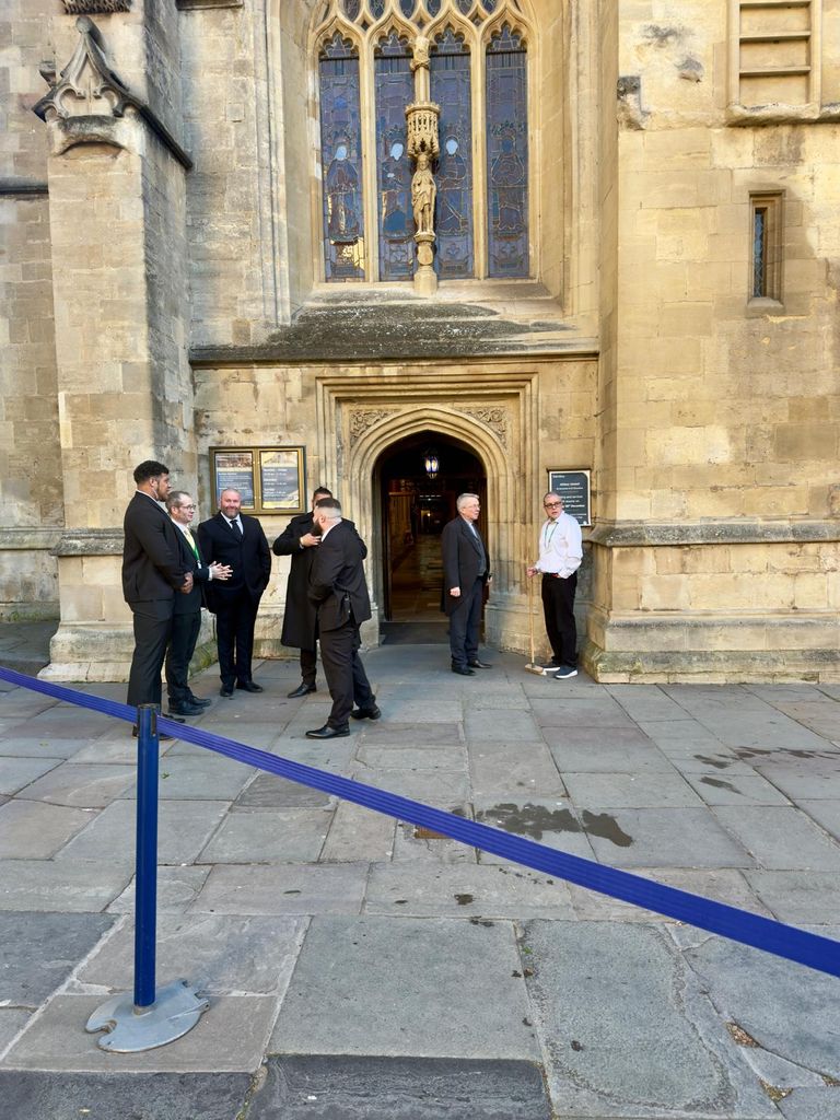 Security guards stood outside Holly Ramsay and Adam Peaty's wedding venue, Bath Abbey