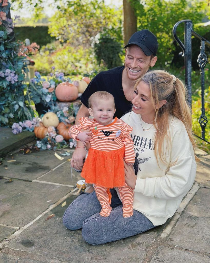 Joe and Stacey with little Belle last month