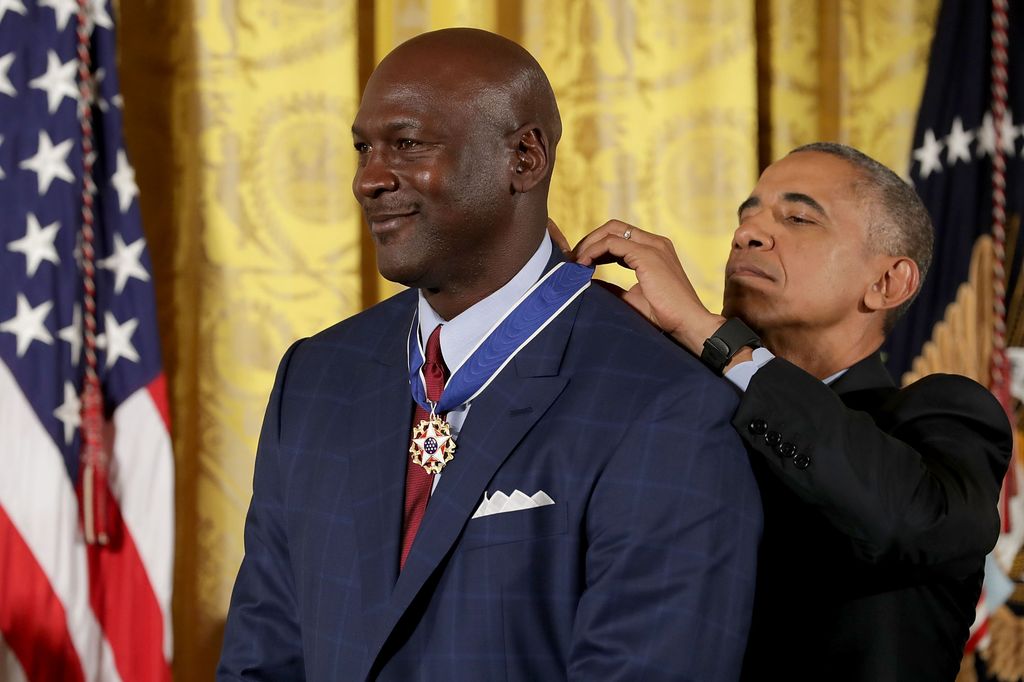 U.S. President Barack Obama awards the Presidential Medal of Freedom to National Basketball Association Hall of Fame member and legendary athlete Michael Jordan during a ceremony in the East Room of the White House November 22, 2016 in Washington, DC. Obama presented the medal to 19 living and two posthumous pioneers in science, sports, public service, human rights, politics and the arts.