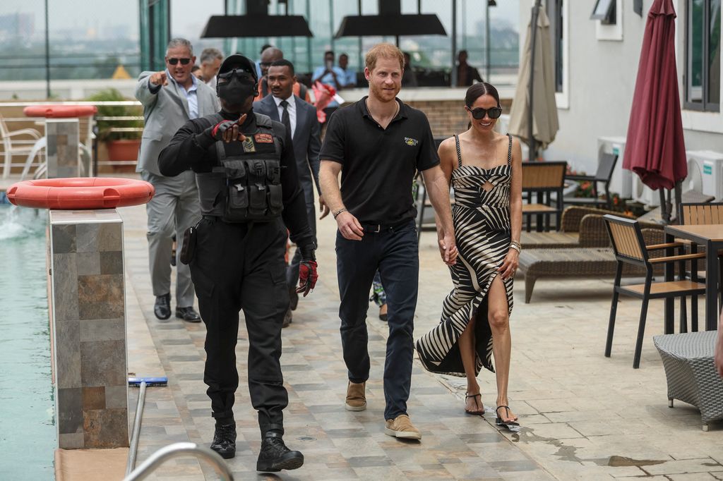 Prince Harry and Meghan arrive for a sitting volleyball match at Nigeria Unconquered, a local charity organisation that supports wounded, injured, or sick servicemembers, in Abuja