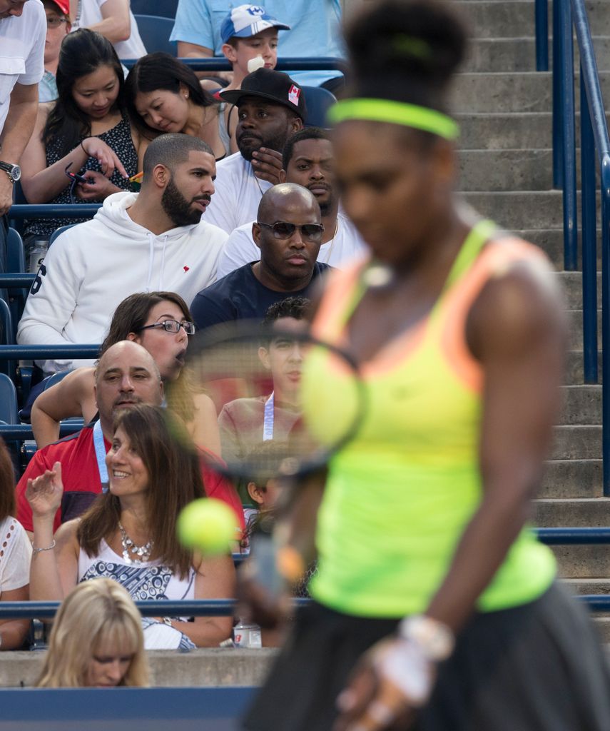 Drake (hoodie and beard) sits courtside for Serena Williams (USA) vs Belinda Bencic (SUI) in semi final tennis action of Rogers Cup play at the Aviva Centre on AUGUST 15, 2015